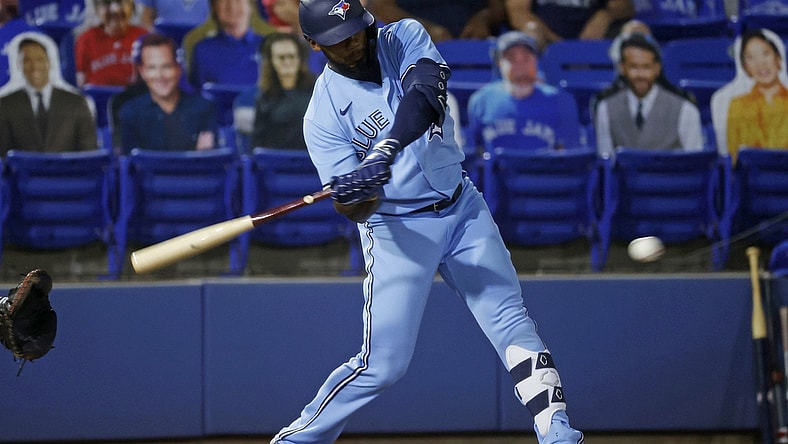 May 18, 2021; Dunedin, Florida, CAN; Toronto Blue Jays right fielder Teoscar Hernandez (37) singles during the third inning against the Boston Red Sox at TD Ballpark. Mandatory Credit: Kim Klement-USA TODAY Sports