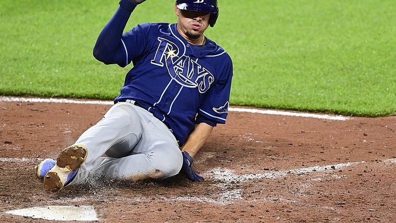 May 19, 2021; Baltimore, Maryland, USA;  Tampa Bay Rays shortstop Willy Adames (1) scores during the eighth inning against the Baltimore Orioles at Oriole Park at Camden Yards. Mandatory Credit: Tommy Gilligan-USA TODAY Sports