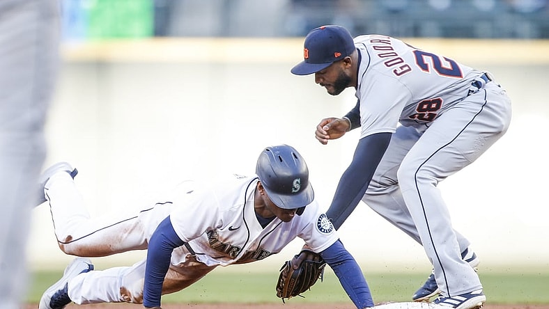 May 19, 2021; Seattle, Washington, USA; Seattle Mariners center fielder Kyle Lewis (1) steals second base against Detroit Tigers shortstop Niko Goodrum (28) during the first inning at T-Mobile Park. Mandatory Credit: Joe Nicholson-USA TODAY Sports