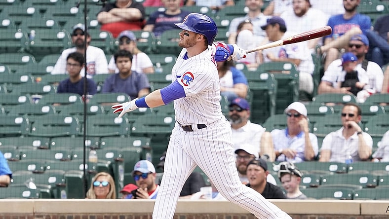May 20, 2021; Chicago, Illinois, USA; Chicago Cubs center fielder Ian Happ (8) hits a two run home run against the Washington Nationals during the third inning at Wrigley Field. Mandatory Credit: David Banks-USA TODAY Sports