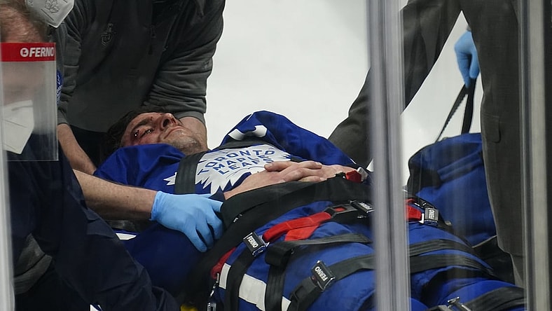 May 20, 2021; Toronto, Ontario, CAN; Toronto Maple Leafs  forward John Tavares (91) is taken off of the ice on a stretcher after a collision with Montreal Canadiens forward Corey Perry (not pictured) during the first period of game one of the first round of the 2021 Stanley Cup Playoffs at Scotiabank Arena. Mandatory Credit: John E. Sokolowski-USA TODAY Sports