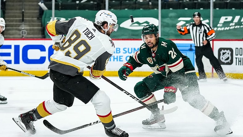 May 20, 2021; Saint Paul, Minnesota, USA; Minnesota Wild defenseman Matt Dumba (24) blocks a shot from Vegas Golden Knights forward Alex Tuch (89) during the first period in game three of the first round of the 2021 Stanley Cup Playoffs at Xcel Energy Center. Mandatory Credit: Brace Hemmelgarn-USA TODAY Sports