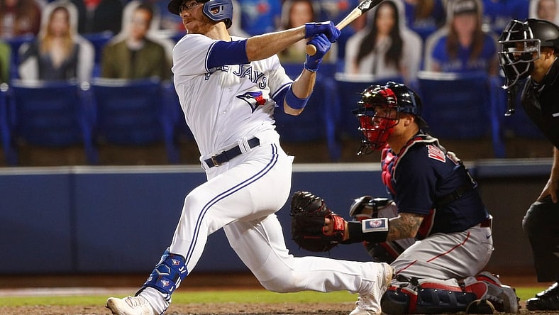 May 20, 2021; Dunedin, Florida, CAN; Toronto Blue Jays catcher Danny Jansen (9) hits a double during the sixth inning agains the Boston Red Sox at TD Ballpark. Mandatory Credit: Nathan Ray Seebeck-USA TODAY Sports
