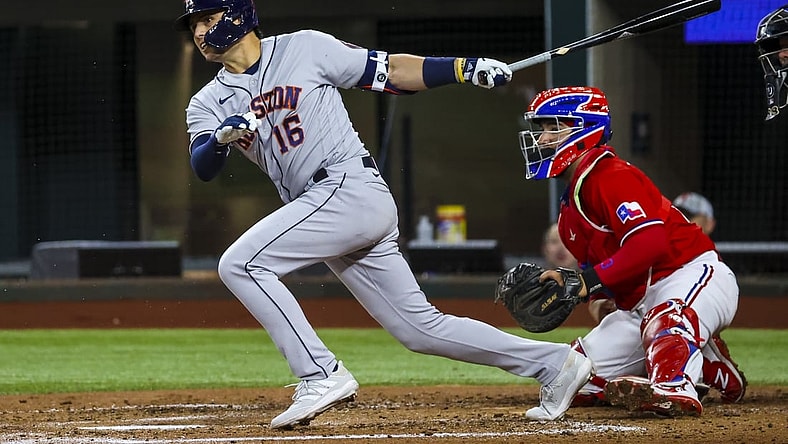 May 21, 2021; Arlington, Texas, USA; Houston Astros shortstop Aledmys Diaz (16) hits an rbi fielder's choice during the second inning against the Texas Rangers at Globe Life Field. Mandatory Credit: Kevin Jairaj-USA TODAY Sports