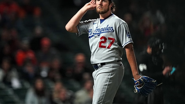 May 21, 2021; San Francisco, California, USA; Los Angeles Dodgers starting pitcher Trevor Bauer (27) gestures after being removed from the game during the seventh inning against the San Francisco Giants at Oracle Park. Mandatory Credit: Darren Yamashita-USA TODAY Sports