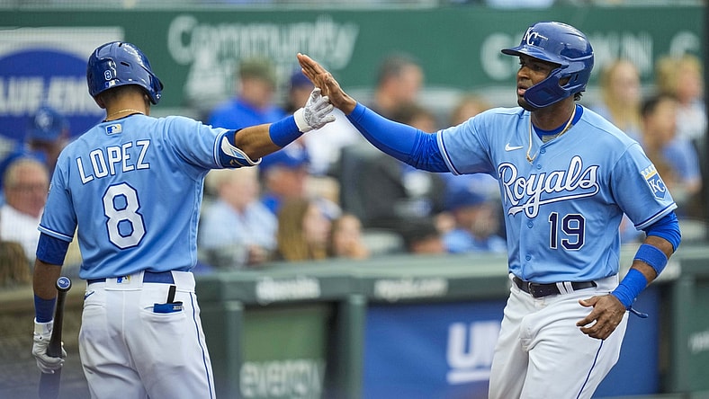 May 22, 2021; Kansas City, Missouri, USA; Kansas City Royals third baseman Kelvin Gutierrez (19) celebrates with shortstop Nicky Lopez (8) after scoring against the Detroit Tigers during the fourth inning at Kauffman Stadium. Mandatory Credit: Jay Biggerstaff-USA TODAY Sports