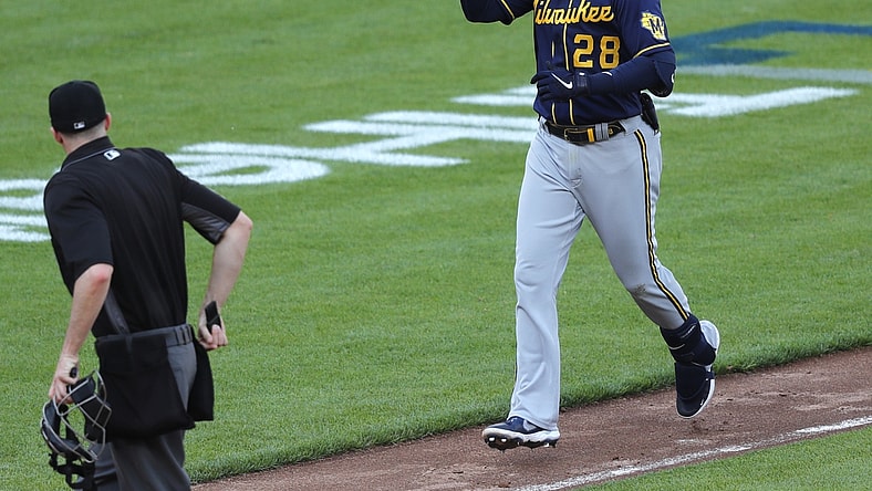 May 22, 2021; Cincinnati, Ohio, USA; Milwaukee Brewers  Daniel Robertson reacts after hitting a solo home run against the Cincinnati Reds during the seventh inning at Great American Ball Park. Mandatory Credit: David Kohl-USA TODAY Sports