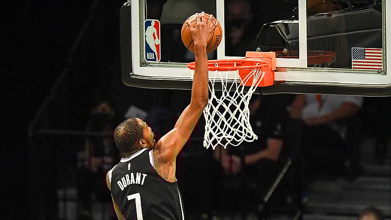 May 22, 2021; Brooklyn, New York, USA;  Brooklyn Nets forward Kevin Durant (7) dunks the ball against the Boston Celtics during the second quarter of game one in the first round of the 2021 NBA Playoffs. at Barclays Center. Mandatory Credit: Dennis Schneidler-USA TODAY Sports