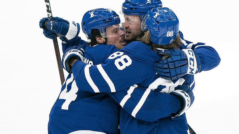 May 22, 2021; Toronto, Ontario, CAN; Toronto Maple Leafs center William Nylander (88) celebrates with center Auston Matthews (34) after scoring a goal against the Montreal Canadaiens during the third period in game two of the first round of the 2021 Stanley Cup Playoff at Scotiabank Arena. Mandatory Credit: Nick Turchiaro-USA TODAY Sports