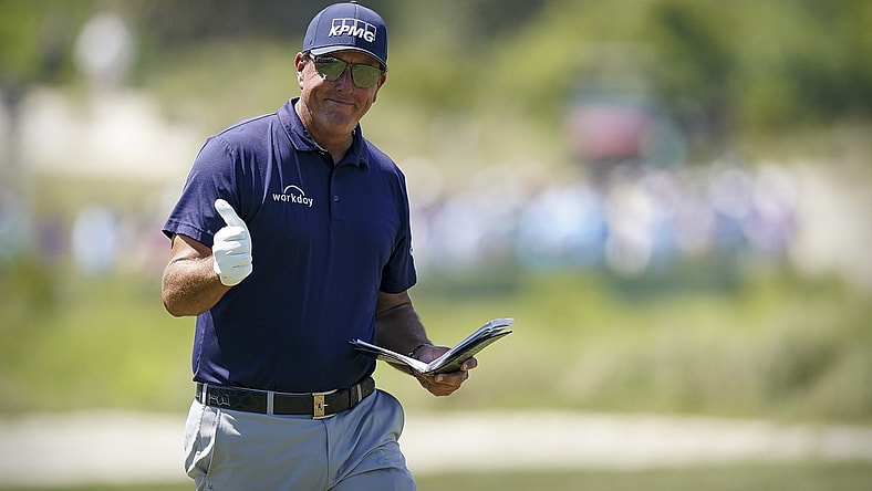 May 23, 2021; Kiawah Island, South Carolina, USA; Phil Mickelson gives a thumbs up to the fans while walking on the 2nd hole fairway during the final round of the PGA Championship golf tournament. Mandatory Credit: David Yeazell-USA TODAY Sports