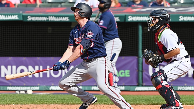May 23, 2021; Cleveland, Ohio, USA; Minnesota Twins left fielder Kyle Garlick (30) hits a home run during the tenth inning against the Cleveland Indians at Progressive Field. Mandatory Credit: Ken Blaze-USA TODAY Sports