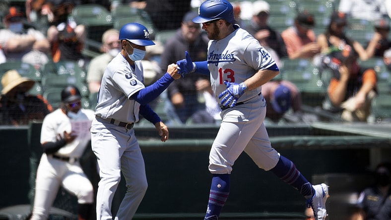 May 23, 2021; San Francisco, California, USA; Los Angeles Dodgers second baseman Max Muncy (13) gets a fist bump from third base coach Dino Ebel after hitting a solo home run against the San Francisco Giants during the fourth inning at Oracle Park. Mandatory Credit: D. Ross Cameron-USA TODAY Sports
