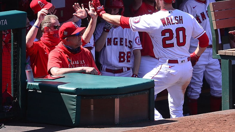 May 23, 2021; Anaheim, California, USA; Los Angeles Angels first baseman Jared Walsh (20) is greeted after hitting a solo home run against the Oakland Athletics during the sixth inning at Angel Stadium. Mandatory Credit: Gary A. Vasquez-USA TODAY Sports
