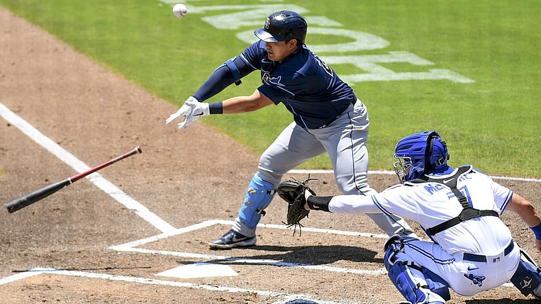 May 24, 2021; Dunedin, Florida, CAN; Tampa Bay Rays infielder Ji-Man Choi (26) loses his bat in the first inning against the Toronto Blue Jays at TD Ballpark. Mandatory Credit: Jonathan Dyer-USA TODAY Sports