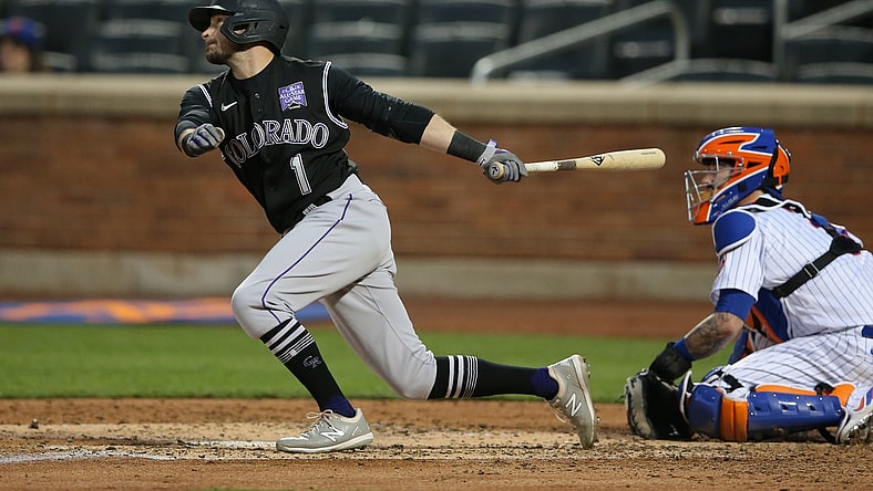 May 24, 2021; New York City, New York, USA; Colorado Rockies center fielder Garrett Hampson (1) follows through on an RBI triple against the New York Mets during the fourth inning at Citi Field. Mandatory Credit: Brad Penner-USA TODAY Sports