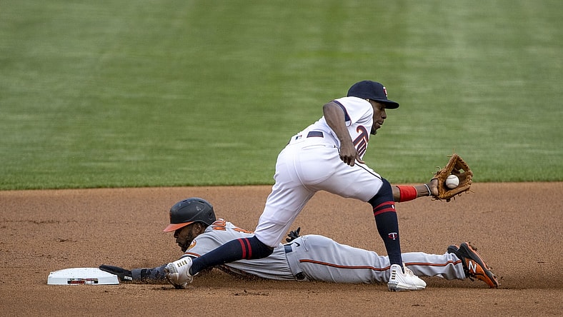 May 24, 2021; Minneapolis, Minnesota, USA; Baltimore Orioles center fielder Cedric Mullins (31) slides safely into second base before Minnesota Twins second baseman Nick Gordon (1) can make a tag in the first inning at Target Field. Mandatory Credit: Jesse Johnson-USA TODAY Sports