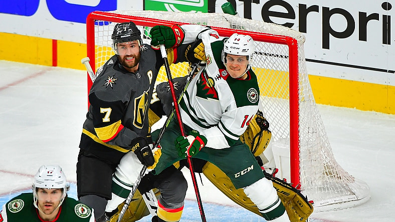 May 24, 2021; Las Vegas, Nevada, USA; Vegas Golden Knights defenseman Alex Pietrangelo (7) battles for position against Minnesota Wild center Joel Eriksson Ek (14) in front of Vegas Golden Knights goaltender Marc-Andre Fleury (29) during the first period of game five of the first round of the 2021 Stanley Cup Playoffs at T-Mobile Arena. Mandatory Credit: Stephen R. Sylvanie-USA TODAY Sports