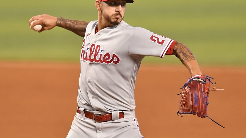 May 25, 2021; Miami, Florida, USA; Philadelphia Phillies starting pitcher Vince Velasquez (21) throws to first base during the first inning against the Miami Marlins at loanDepot Park. Mandatory Credit: Jim Rassol-USA TODAY Sports