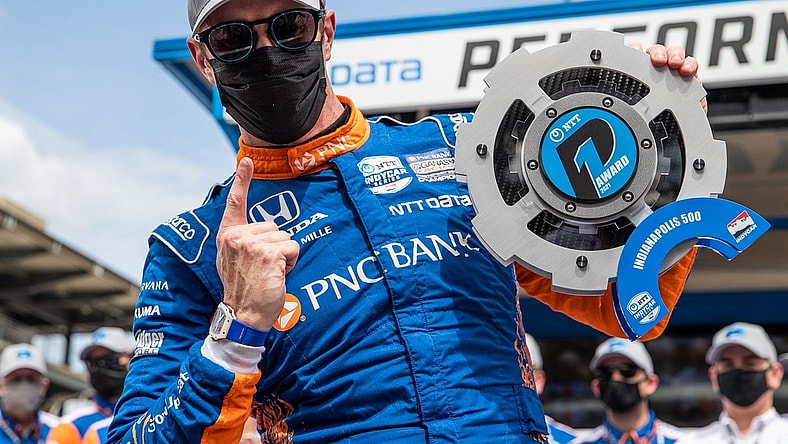 Scott Dixon (9) celebrates winning the pole for the 105th running of the Indianapolis 500 on May 22.

Syndication The Indianapolis Star