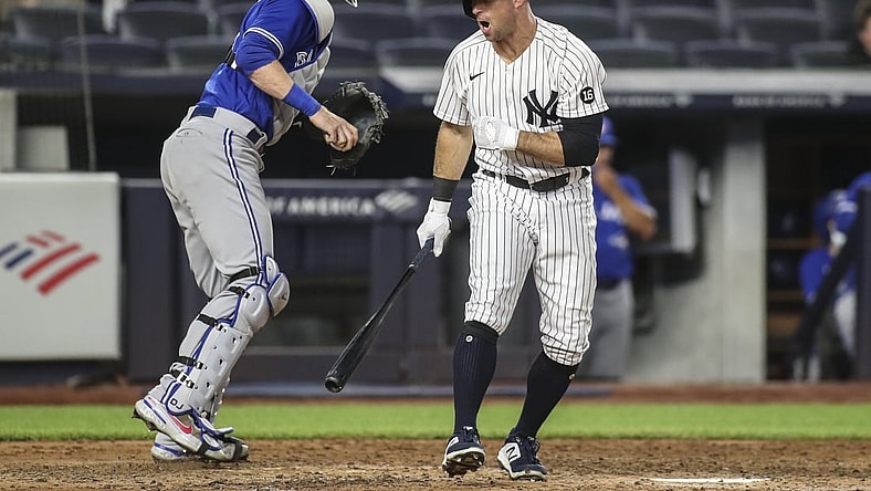 May 25, 2021; Bronx, New York, USA;  New York Yankees center fielder Brett Gardner (11) reacts after striking out to end the fifth inning against the Toronto Blue Jays at Yankee Stadium. Mandatory Credit: Wendell Cruz-USA TODAY Sports