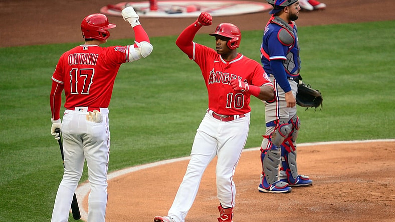 May 25, 2021; Anaheim, California, USA; Los Angeles Angels left fielder Justin Upton (10) is greeted by designated hitter Shohei Ohtani (17) after hitting a solo home run against the Texas Rangers during the first inning at Angel Stadium. Mandatory Credit: Gary A. Vasquez-USA TODAY Sports
