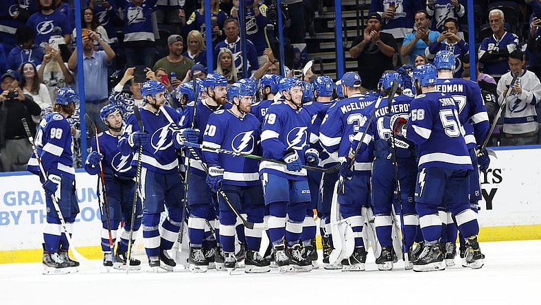 May 26, 2021; Tampa, Florida, USA;Tampa Bay Lightning right wing Barclay Goodrow (19) and teammates  celebrate as they beat the Florida Panthers during game six of the first round of the 2021 Stanley Cup Playoffs at Amalie Arena. Mandatory Credit: Kim Klement-USA TODAY Sports