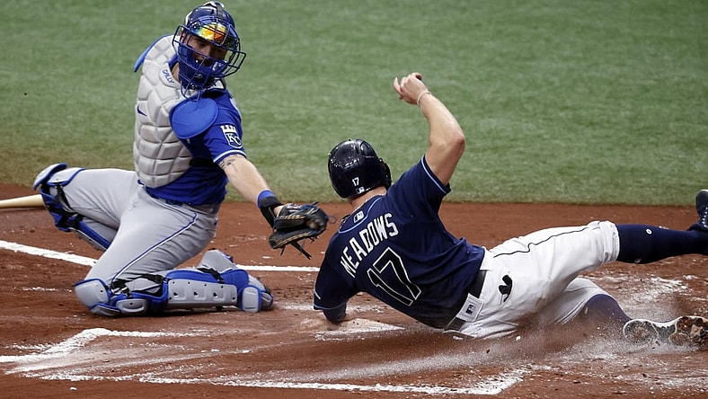 May 27, 2021; St. Petersburg, Florida, USA;  Tampa Bay Rays designated hitter Austin Meadows (17) scores a run as he slides in safe at home plate ad Kansas City Royals catcher Cam Gallagher (36) attempted to tag him out during the first inning at Tropicana Field. Mandatory Credit: Kim Klement-USA TODAY Sports