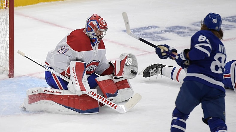 May 27, 2021; Toronto, Ontario, CAN;  Montreal Canadiens goalie Carey Price (31) saves a shot from Toronto Maple Leafs forward William Nylander (88) in game five of the first round of the 2021 Stanley Cup Playoffs at Scotiabank Arena. Mandatory Credit: Dan Hamilton-USA TODAY Sports