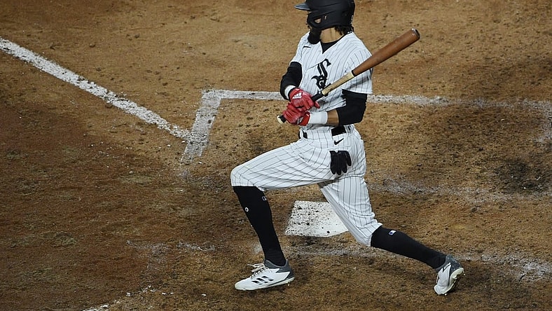 May 27, 2021; Chicago, Illinois, USA; Chicago White Sox center fielder Billy Hamilton (0) hits a RBI single in the sixth inning against the Baltimore Orioles at Guaranteed Rate Field. Mandatory Credit: Quinn Harris-USA TODAY Sports
