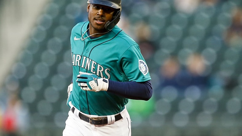 May 28, 2021; Seattle, Washington, USA; Seattle Mariners left fielder Kyle Lewis (1) runs the bases after hitting a two-run home run against the Texas Rangers during the third inning at T-Mobile Park. Mandatory Credit: Joe Nicholson-USA TODAY Sports