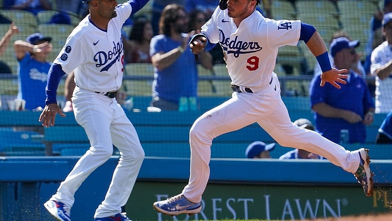 May 29, 2021; Los Angeles, California, USA; Los Angeles Dodgers second baseman Gavin Lux (9) rounds third base and goes on to score on a double by Justin Turner (not pictured) in the first inning against the San Francisco Giants at Dodger Stadium. Mandatory Credit: Robert Hanashiro-USA TODAY Sports
