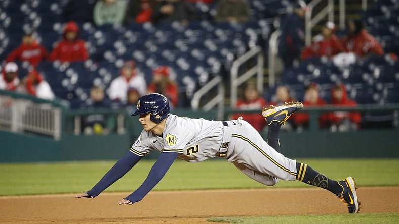 May 29, 2021; Washington, District of Columbia, USA; Milwaukee Brewers third baseman Luis Urias (2) steals second base during the fourth inning against the Washington Nationals at Nationals Park. Mandatory Credit: Amber Searls-USA TODAY Sports