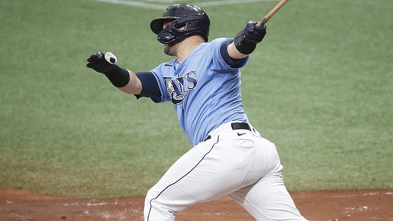 May 30, 2021; St. Petersburg, Florida, USA; Tampa Bay Rays catcher Mike Zunino (10) hits a home run during the second inning against the Philadelphia Phillies at Tropicana Field. Mandatory Credit: Kim Klement-USA TODAY Sports