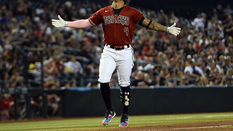 May 30, 2021; Phoenix, Arizona, USA; Arizona Diamondbacks second baseman Ketel Marte (4) reacts as he runs the bases after hitting a home run against the St. Louis Cardinals during the third inning at Chase Field. Mandatory Credit: Joe Camporeale-USA TODAY Sports