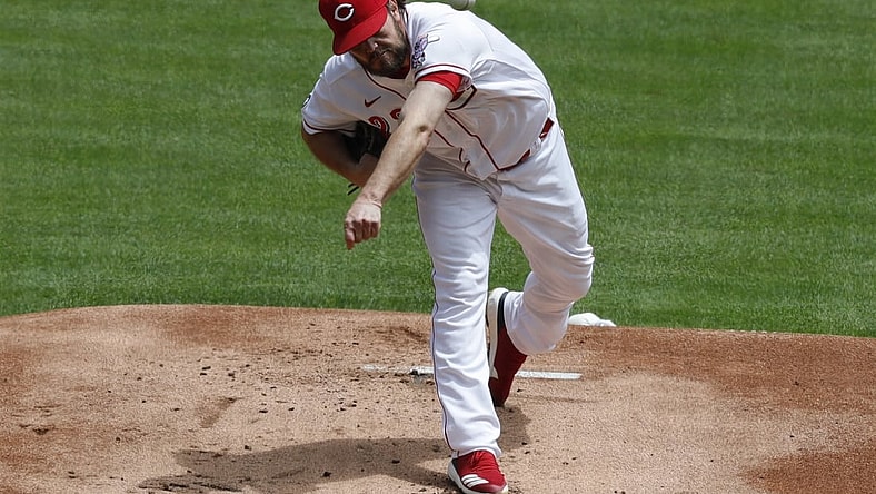 May 31, 2021; Cincinnati, Ohio, USA; Cincinnati Reds Wade Miley throws against the Philadelphia Phillies during the first inning at Great American Ball Park. Mandatory Credit: David Kohl-USA TODAY Sports