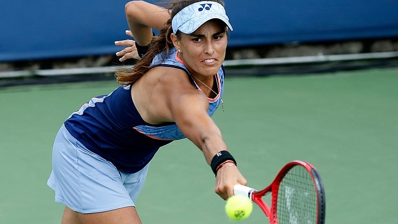Monica Puig returns a shot in the second set during the Western & Southern Open match between Monica Puig and Yafan Wang at the Lindner Family Tennis Center in Mason, Ohio, on Tuesday, Aug. 13, 2019. Wang advanced with a 3-6, 7-5, 6-3 win. 

Monica Puig Vs Yafan Wang Western Southern Open