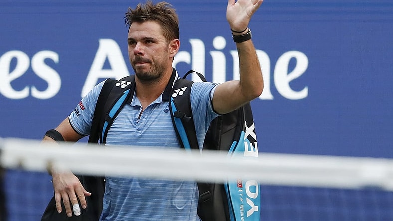 Sep 3, 2019; Flushing, NY, USA; Stan Wawrinka of Switzerland waves to the crowd while leaving the court after his match against Daniil Medvedev of Russia (not pictured) in a quarterfinal match on day nine of the 2019 US Open tennis tournament at USTA Billie Jean King National Tennis Center. Mandatory Credit: Geoff Burke-USA TODAY Sports