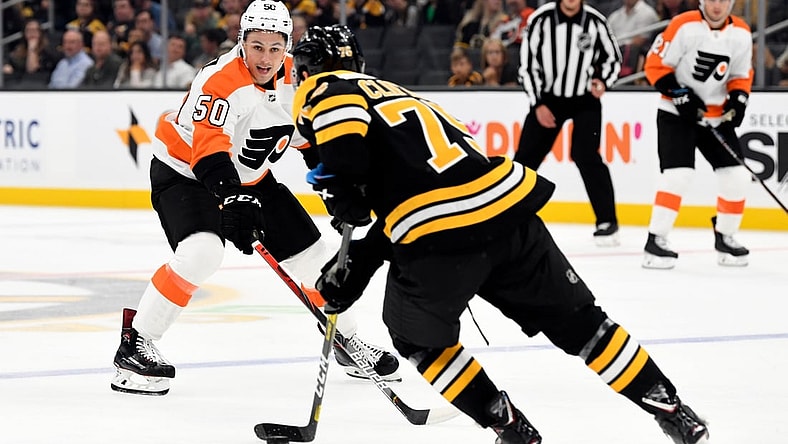 Sep 23, 2019; Boston, MA, USA; Philadelphia Flyers center German Rubtsov (50) defends Boston Bruins defenseman Connor Clifton (75) during the first period at TD Garden. Mandatory Credit: Brian Fluharty-USA TODAY Sports