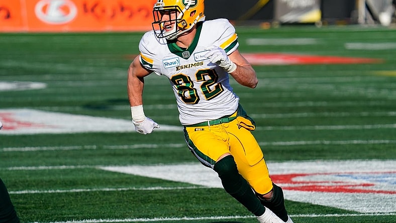 Nov 17, 2019; Hamilton, Ontario, CAN; Edmonton Eskimos wide receiver Greg Ellingson (82) runs a pass pattern against the Hamilton Tiger-Cats during the CFL Eastern Conference Final football game at Tim Hortons Field. Mandatory Credit: John E. Sokolowski-USA TODAY Sports