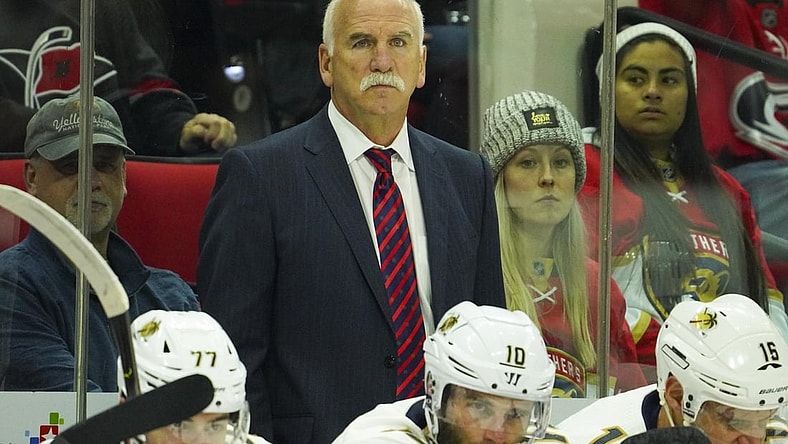 Dec 21, 2019; Raleigh, North Carolina, USA;  Florida Panthers head coach Joel Quenneville looks on from behind the players bench against the Carolina Hurricanes at PNC Arena. The Florida Panthers defeated the Carolina Hurricanes 4-2. Mandatory Credit: James Guillory-USA TODAY Sports
