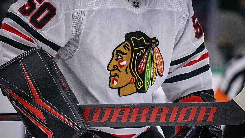 Feb 23, 2020; Dallas, Texas, USA; A view of the logo and hockey stick of Chicago Blackhawks goaltender Corey Crawford (50) in action during the game between the Stars and the Blackhawks at the American Airlines Center. Mandatory Credit: Jerome Miron-USA TODAY Sports