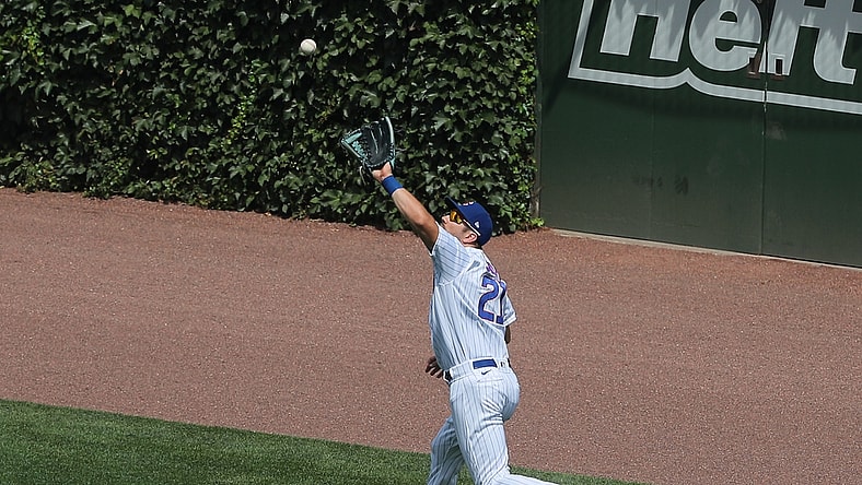Aug 2, 2020; Chicago, Illinois, USA; Chicago Cubs right fielder Steven Souza Jr. (21) catches a fly ball off the bat of Pittsburgh Pirates first baseman Jose Osuna (not pictured) during the third inning against the Pittsburgh Pirates at Wrigley Field. Mandatory Credit: Dennis Wierzbicki-USA TODAY Sports