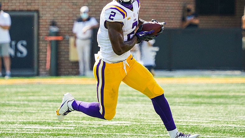 Oct 10, 2020; Columbia, Missouri, USA; LSU Tigers tight end Arik Gilbert (2) runs against the Missouri Tigers during the first half at Faurot Field at Memorial Stadium. Mandatory Credit: Jay Biggerstaff-USA TODAY Sports