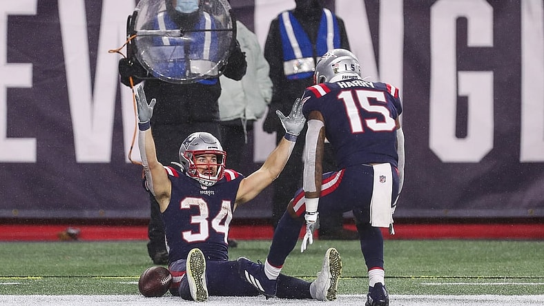 Nov 15, 2020; Foxborough, Massachusetts, USA; New England Patriots running back Rex Burkhead (34) celebrates after scoring a touchdown during the first half against the Baltimore Ravens at Gillette Stadium. Mandatory Credit: Paul Rutherford-USA TODAY Sports