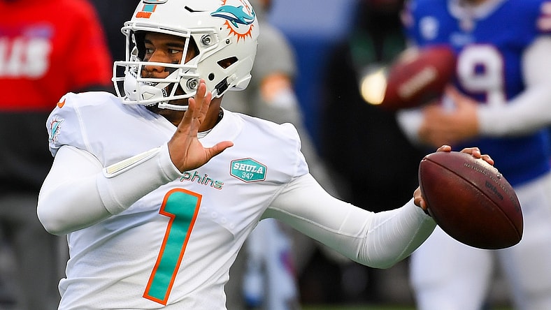 Jan 3, 2021; Orchard Park, New York, USA; Miami Dolphins quarterback Tua Tagovailoa (1) warms up prior to the game against the Buffalo Bills at Bills Stadium. Mandatory Credit: Rich Barnes-USA TODAY Sports