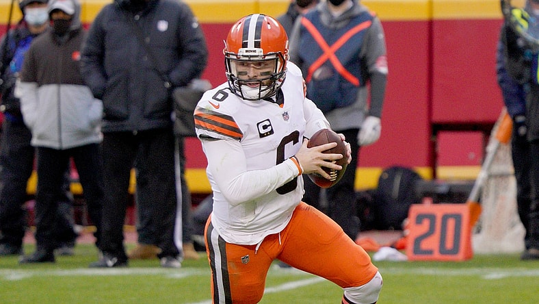 Jan 17, 2021; Kansas City, Missouri, USA; Cleveland Browns quarterback Baker Mayfield (6) drops back to pass during the AFC Divisional Round playoff game against the Kansas City Chiefs at Arrowhead Stadium. Mandatory Credit: Denny Medley-USA TODAY Sports