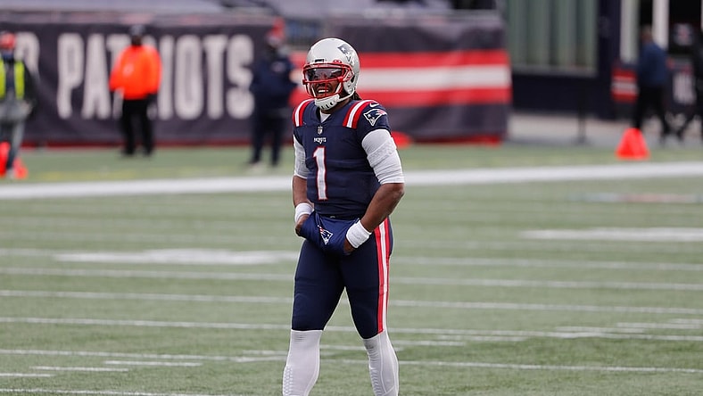 Jan 3, 2021; Foxborough, Massachusetts, USA; New England Patriots quarterback Cam Newton smiles against the New York Jets during the first half at Gillette Stadium. Mandatory Credit: Winslow Townson-USA TODAY Sports