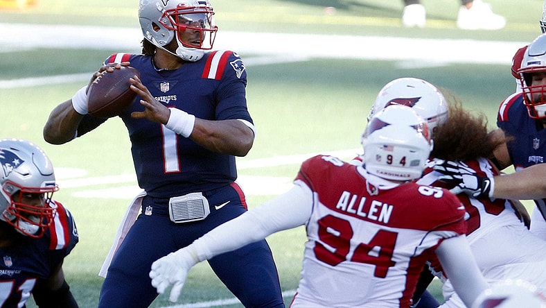 Published Caption:  Patriots quarterback Cam Newton looks for a receiver in the first half against the Arizona Cardinals on Sunday afternoon. [The Providence Journal / Kris Craig] Original Caption:  Patriots quarterback Cam Newton looks for a receiver in the first half against the Arizona Cardinals on Sunday afternoon.

LEDE 2