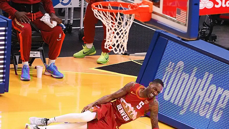 Apr 23, 2021; San Francisco, California, USA; Denver Nuggets guard Will Barton (5) lays on the court with an injury during the first quarter against the Golden State Warriors at Chase Center. Mandatory Credit: Kelley L Cox-USA TODAY Sports