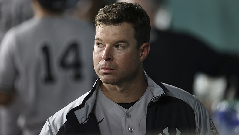 May 19, 2021; Arlington, Texas, USA; New York Yankees starting pitcher Corey Kluber (28) watches from the dugout during the game against the Texas Rangers at Globe Life Field. Mandatory Credit: Kevin Jairaj-USA TODAY Sports
